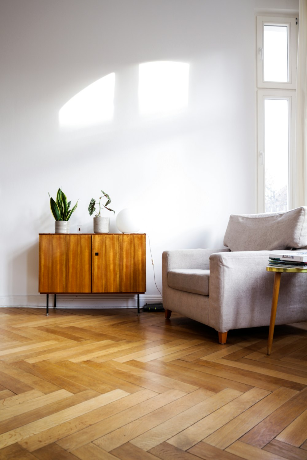 Refurbished period interior with herringbone oak flooring